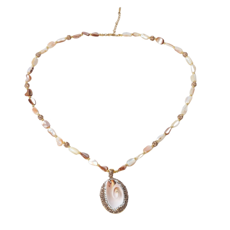 A beautifully handcrafted necklace featuring a unique shell pendant, framed with shimmering gold accents and complemented by natural stone beads. This elegant piece is designed to add a touch of sophistication to your style.