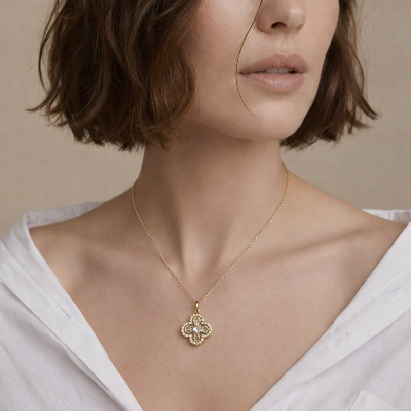 Close-up of the intricate flower design on the pendant, showcasing the brilliance of the zirconia stones and the fine craftsmanship of the 925 sterling silver, adding a sophisticated touch to your jewelry collection.