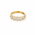 five-stone diamond ring in gold-plated metal with clear stones